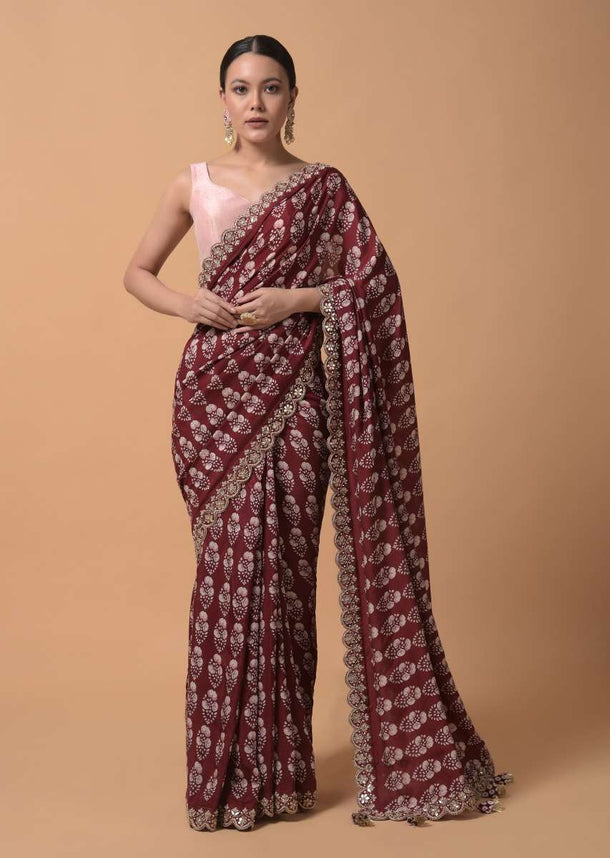 Maroon Saree With Floral Printed Buttis And Gotta Embroidered Border