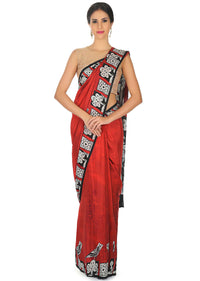 Maroon saree in crepe satin with human face motif only on Kalki