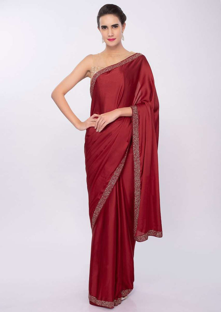 Maroon satin crepe saree with cut dana embroidered border only on Kalki