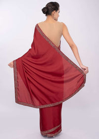 Maroon satin crepe saree with cut dana embroidered border only on Kalki