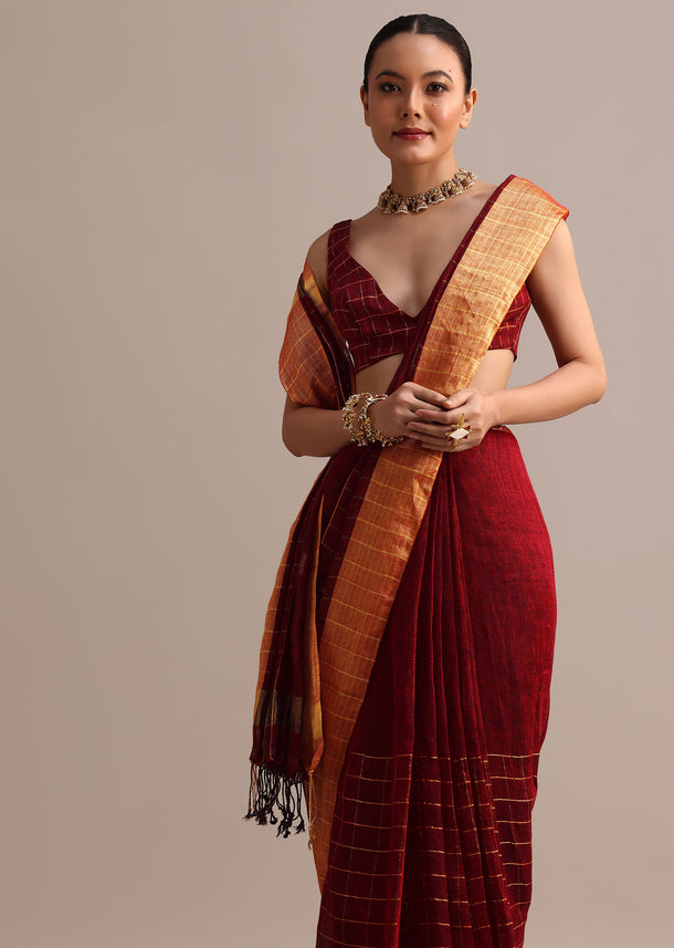 Maroon Linen Woven Saree With Zari Border And Unstitched Blouse