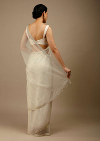 Marshmallow White Saree In Organza With Moti Beads And Stone Embroidered Round Motifs On The Border And Butti Design