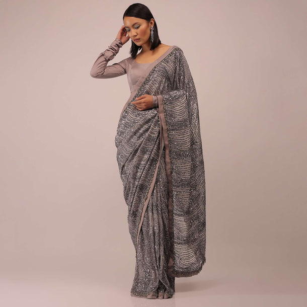 Mauve Purple Satin Saree In Sequins Embroidery With A Crop Top In Full Sleeves And A Round Neckline