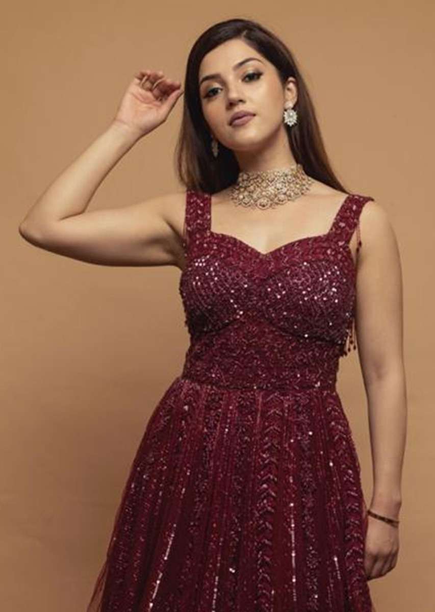 Mehreen In Kalki Burgundy Gown In Embellished Net With Fancy Cut Out Back