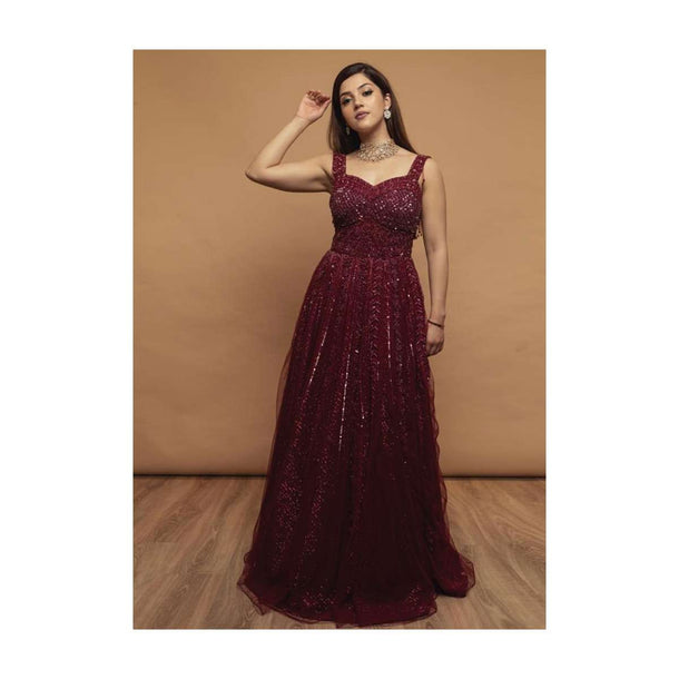 Mehreen In Kalki Burgundy Gown In Embellished Net With Fancy Cut Out Back