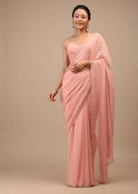 Mellow Rose Shaded Georgette Saree Woven With Gold Zari Work In a Linear Design and Embroidery Buttis