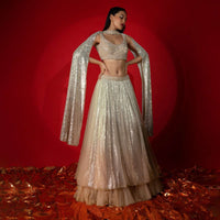 Melon Peach Ombre Lehenga Embellished In Sequins With Heavily Hand Embroidered Choli And Choker Dupatta