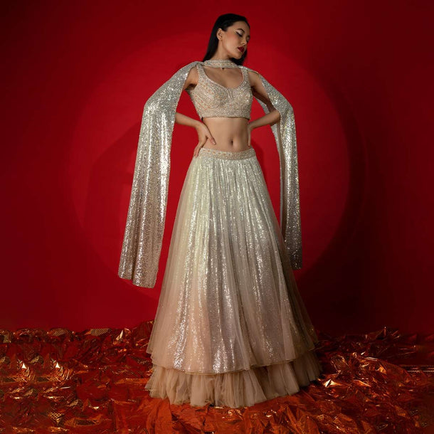 Melon Peach Ombre Lehenga Embellished In Sequins With Heavily Hand Embroidered Choli And Choker Dupatta