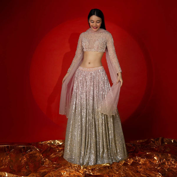 Melon Peach Ombre Lehenga Embellished In Sequins With Moti Embroidered Crop Top With Illusion Neckline And Full Sleeves