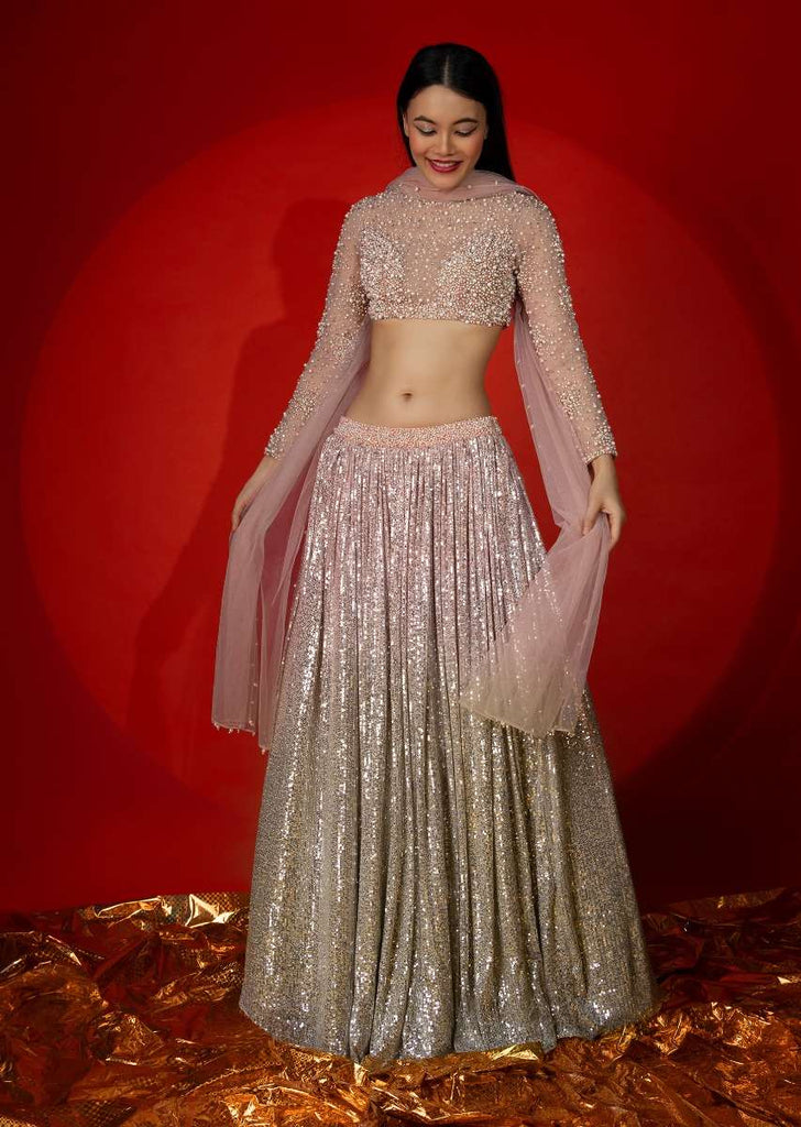 Melon Peach Ombre Lehenga Embellished In Sequins With Moti Embroidered Crop Top With Illusion Neckline And Full Sleeves