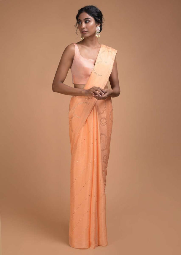 Melon Peach Saree In Chiffon With Badla Work In Diagonal Stripes And Round Motifs Online - Kalki Fashion