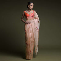 Melon Peach Saree In Organza With Printed Flowers And Unstitched Blouse Online - Kalki Fashion