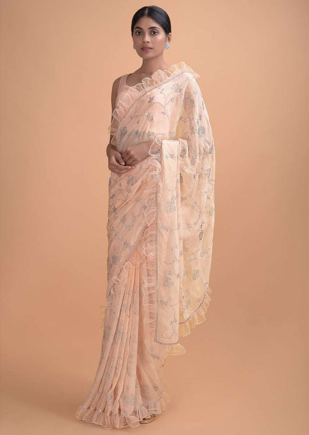 Melon Peach Saree In Silk With Ruffled Border And Kundan Work In Floral And Leaf Online - Kalki Online