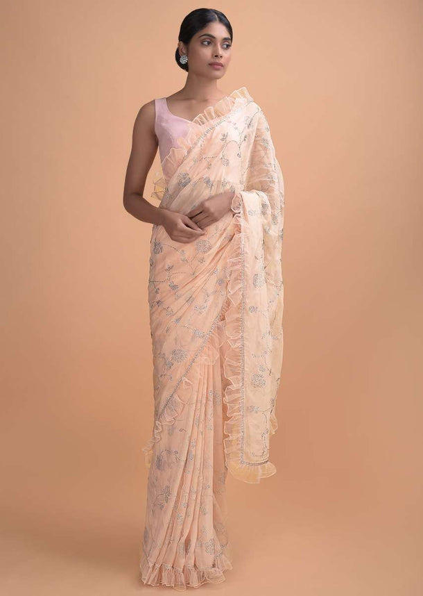 Melon Peach Saree In Silk With Ruffled Border And Kundan Work In Floral And Leaf Online - Kalki Online