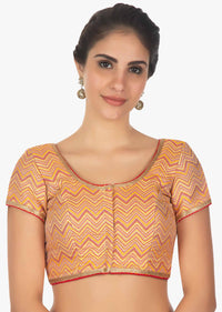Merigold orange brocade blouse with Contrasting multi color zig zag lines only on Kalki