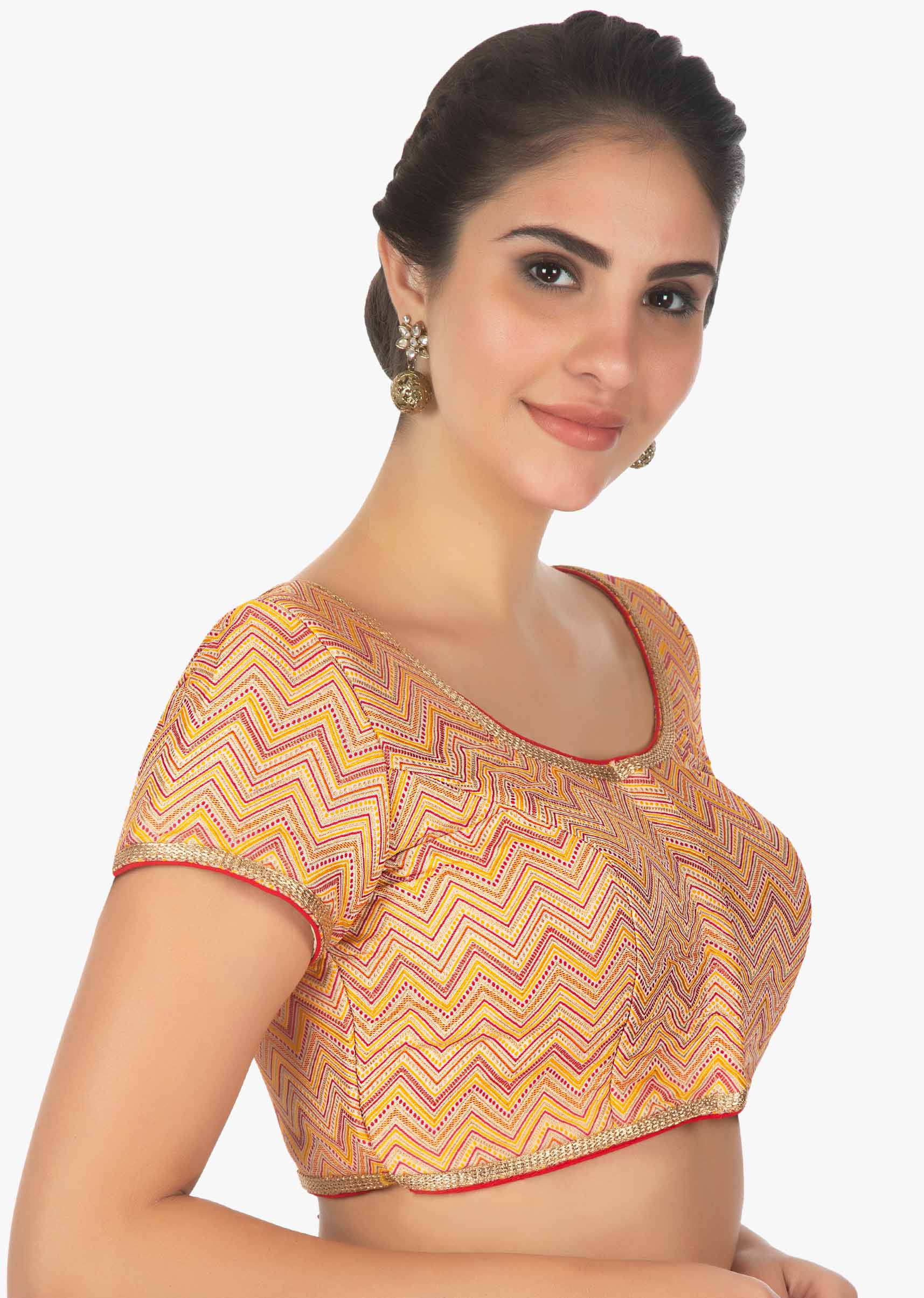 Merigold orange brocade blouse with Contrasting multi color zig zag lines