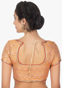 Merigold orange brocade blouse with Contrasting multi color zig zag lines