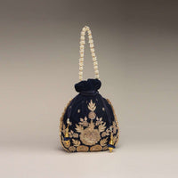 Midnight Blue Potli Bag In Velvet With Hand Embroidered Floral Motif Using Sequins And Zardosi
