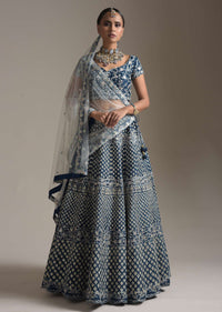 Midnight Blue Lehenga Choli In Raw Silk With Thread And Sequins Embroidered Buttis And Floral Design