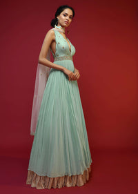 Mint Anarkali Suit With A Plunging Neckline And Hand Embroidered Buttis Featuring Multi Colored Sequins And Beads