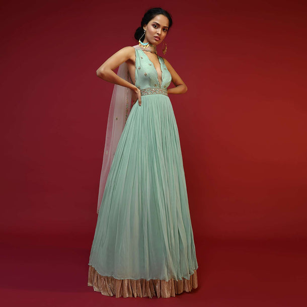 Mint Anarkali Suit With A Plunging Neckline And Hand Embroidered Buttis Featuring Multi Colored Sequins And Beads