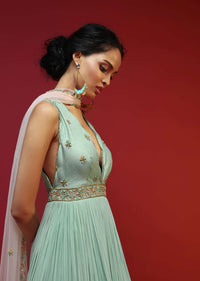 Mint Anarkali Suit With A Plunging Neckline And Hand Embroidered Buttis Featuring Multi Colored Sequins And Beads