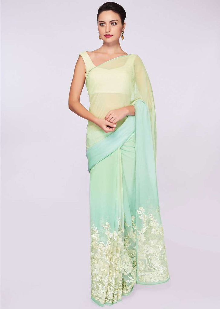 Mint blue and green shaded georgette saree with net embroidered bottom