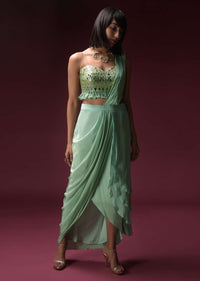 Mint Blue Dhoti Skirt With Attached Saree Drape And Ruffled Crop Top Adorned With Flower Shaped Mirror Work Online - Kalki Fashion