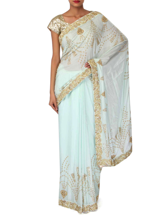 Mint blue saree embellished in moti embroidery only on Kalki