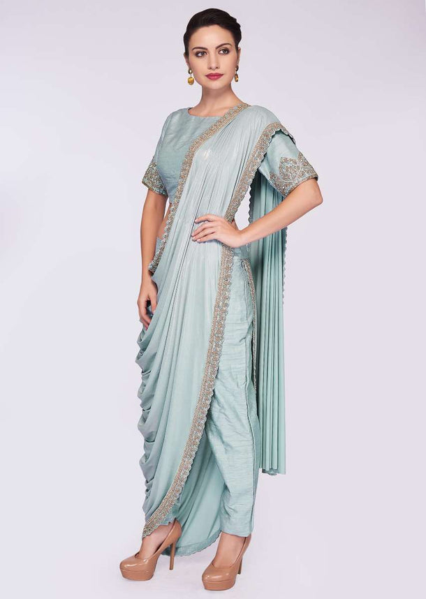 Mint blue saree with pant enhanced with a lycra top layer