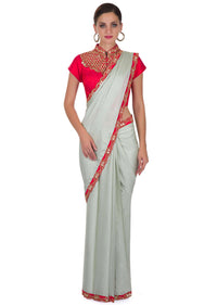 Mint Blue Satin Georgette Saree with Stitched Orange Raw Silk Blouse Featuring Zari Work only on Kalki