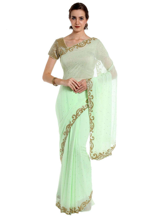 Mint georgette saree adorned with cut dana embroidery only at Kalki