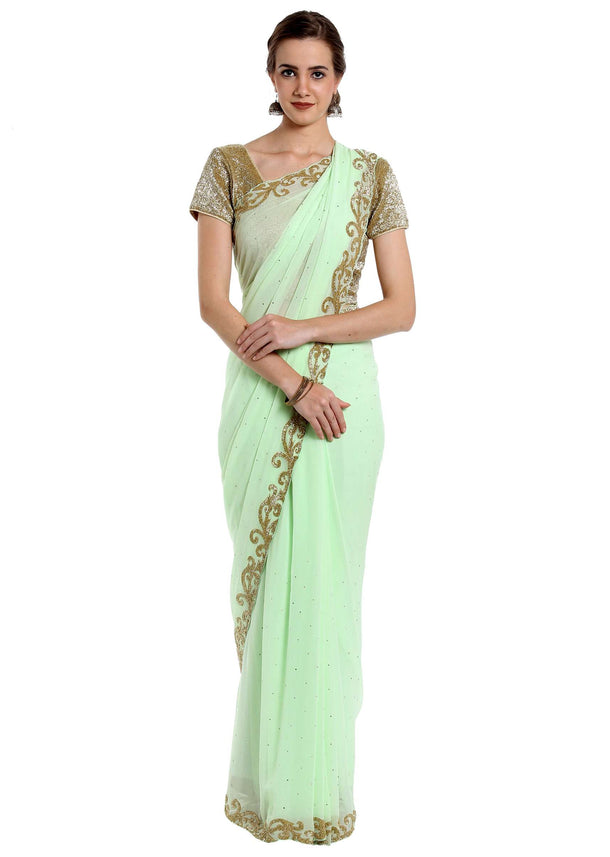 Mint georgette saree adorned with cut dana embroidery only at Kalki