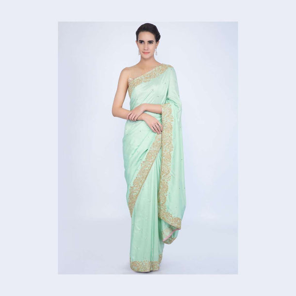 Mint green crepe silk saree with butti and border only on Kalki