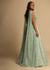 Mint Green Gown In Sequins Embellished Net With Ruching In The Front, Sheer Sides And Net Cape On Each Shoulder Online - Kalki Fashion