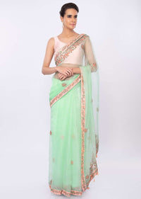 Mint green organza saree in floral embroidery and butti only on kalki
