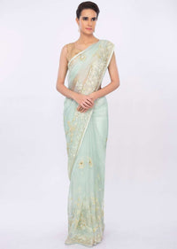 Mint green organza saree in floral embroidery and butti only on kalki