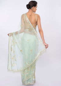 Mint green organza saree in floral embroidery and butti only on kalki