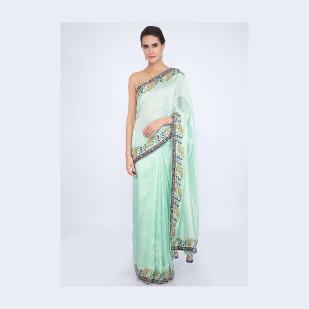 Mint green satin silk saree with embroidered border only on Kalki