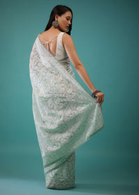 Mint Green Organza Saree In Lucknowi Threadwork, It Has Lacework Detailing On The Border