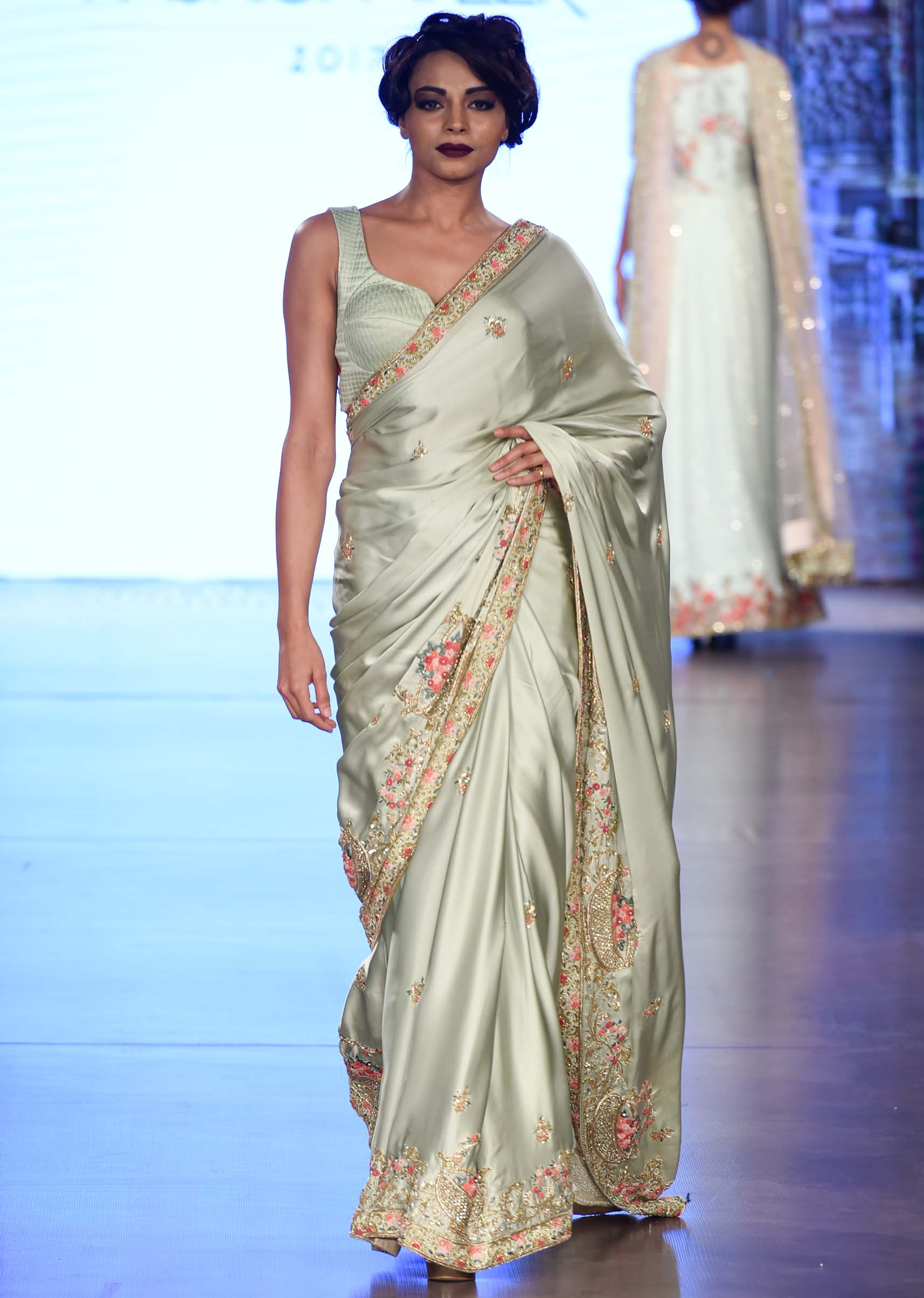 Mint green saree in french knot work and zardosi border