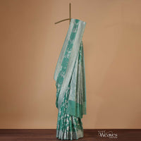 Sea Green Handloom Saree In Tissue Georgette With Zari Weave And An Unstitched Blouse
