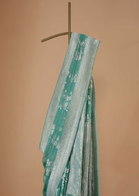 Sea Green Handloom Saree In Tissue Georgette With Zari Weave And An Unstitched Blouse