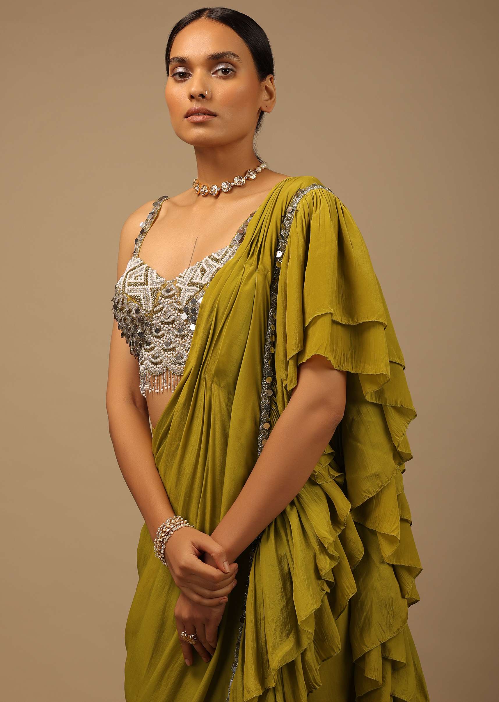 Moss Green Ready Pleated Ruffle Saree With A Heavy Sequins And Cut Dana Embroidered Crop Top