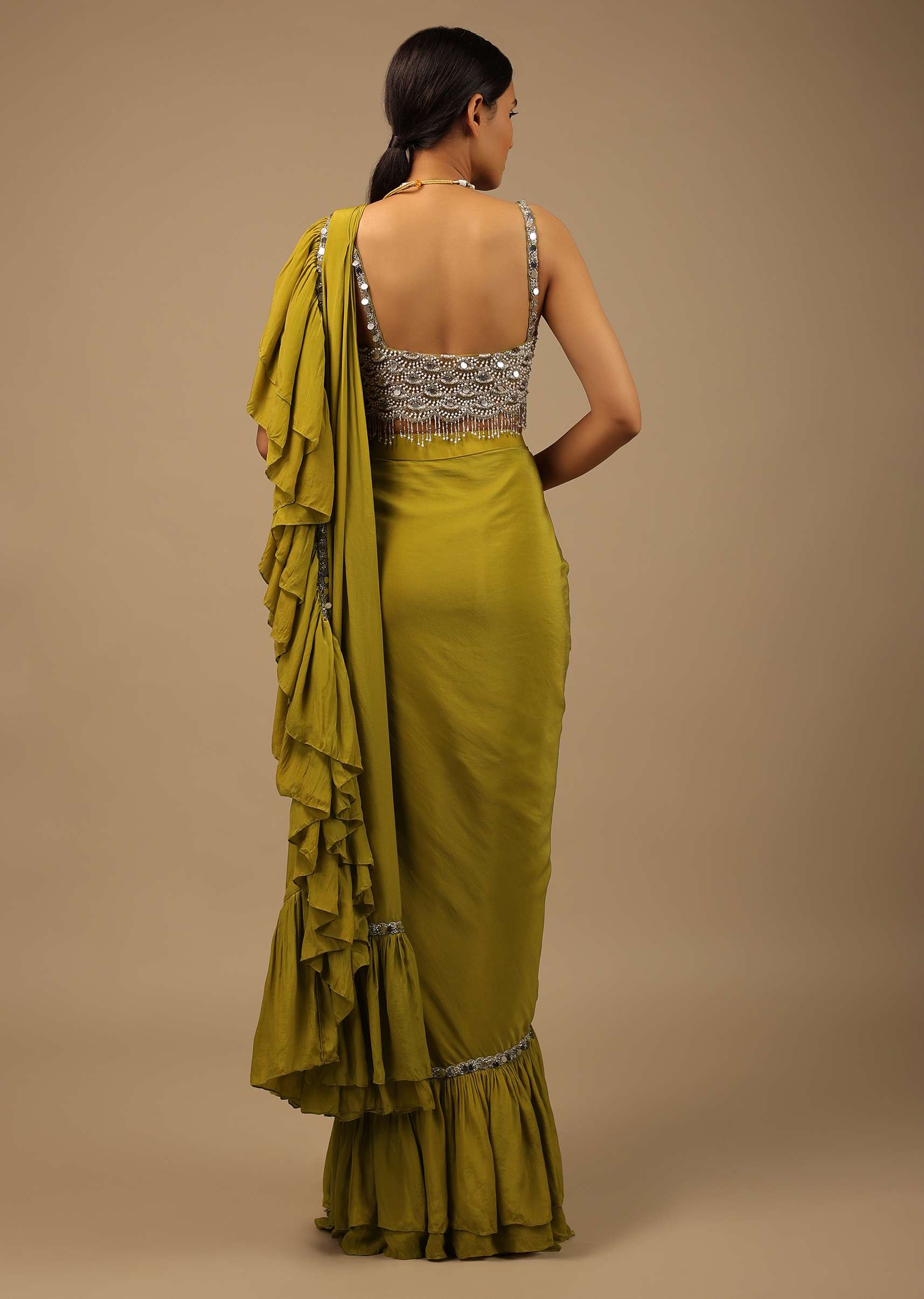 Moss Green Ready Pleated Ruffle Saree With A Heavy Sequins And Cut Dana Embroidered Crop Top