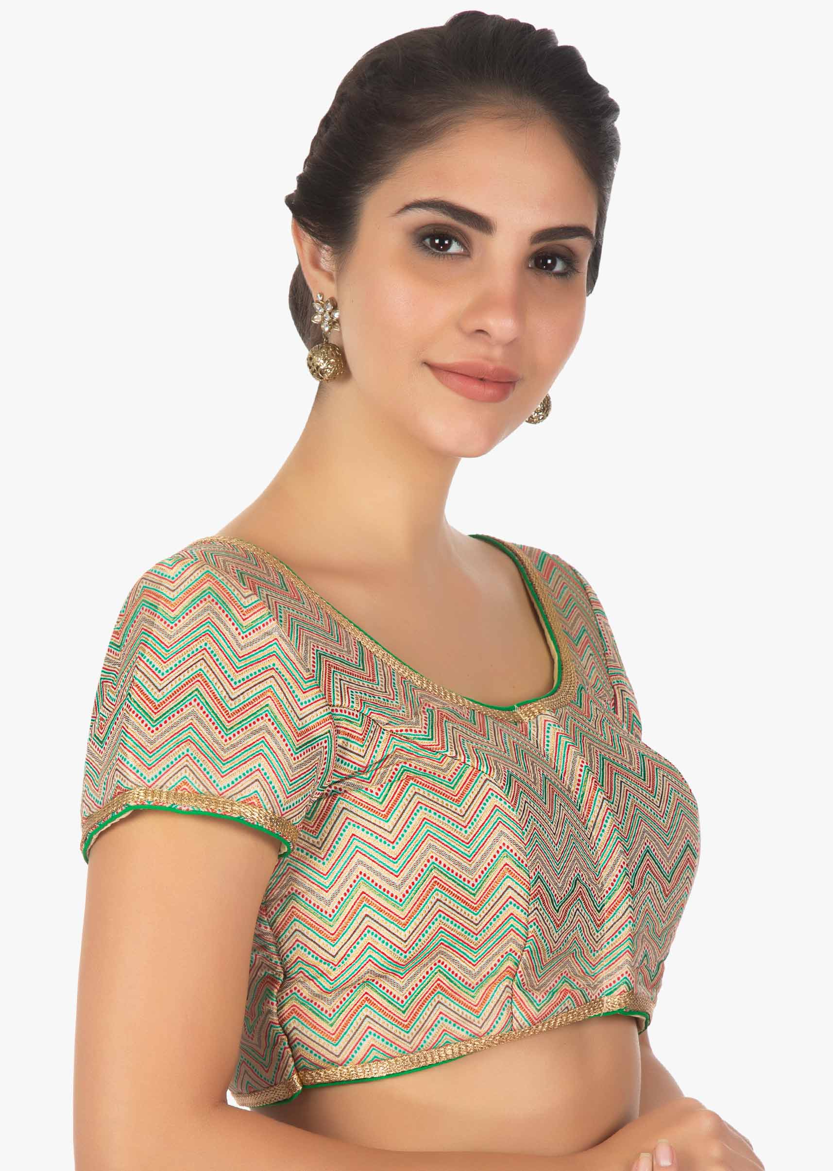 Multi color brocade blouse designed in zig zag lines