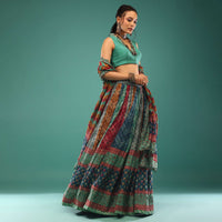 Multi-Colored Lehenga With Bandhani And Jaipuri Hand Block Print. Choli And Dupatta In Sequins,And Beads Embroidery.