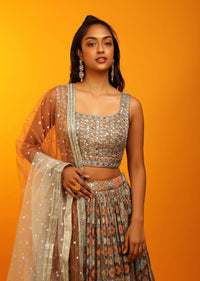 Multi Colored Lehenga Choli In Earthy Hues With Bandhani And Moroccan Jaal Design