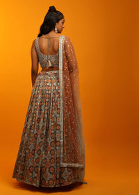 Multi Colored Lehenga Choli In Earthy Hues With Bandhani And Moroccan Jaal Design