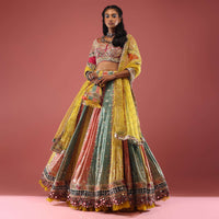 Multi Coloured Brocade Lehenga With Bandhani Print And Heavy Mirror Work On The Border